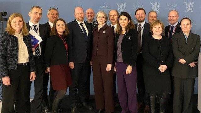 Bilde av kvinne med Open Horizons logo